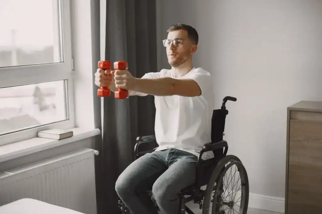 Image of man doing exercise in his wheelchair to aid weight loss Bognor Regis
