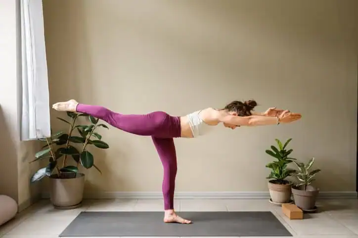 Achieving the Perfect Tone: How Often Should You Exercise for Results? 1 Woman doing Yoga exercise Bognor Regis to help with toning the body.